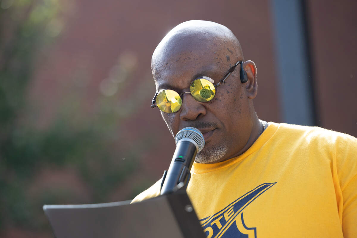 During a Juneteenth flag raising ceremony in East St. Louis on June 18, East St. Louis NAACP vice president George McClellan Jr. reads General Order No. 3, which declared all enslaved people in Texas free in 1865, marking the end of slavery in the United States.