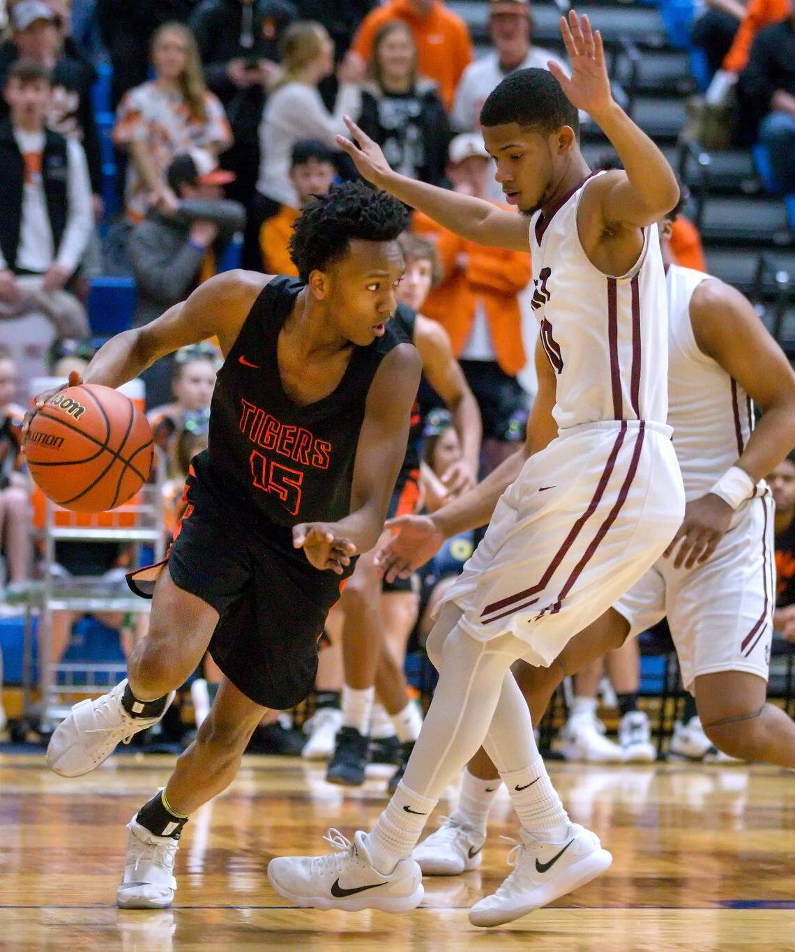 Edwardsville’s Jaylon Tuggle drives against Belleville West’s Lawrence Brazil III during Friday’s O’Fallon Class 4A IHSA Regional Championship game at OTHS’ Panther Dome.