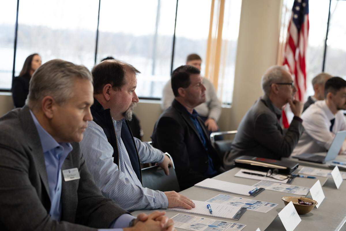 Granite City Mayor Mike Parkinson, second from left, and other local officials attend a meeting with U.S. Sen. Tammy Duckworth to discuss community issues. The hourlong conversation largely focused on data centers because of a developer’s recent interest in Granite City.