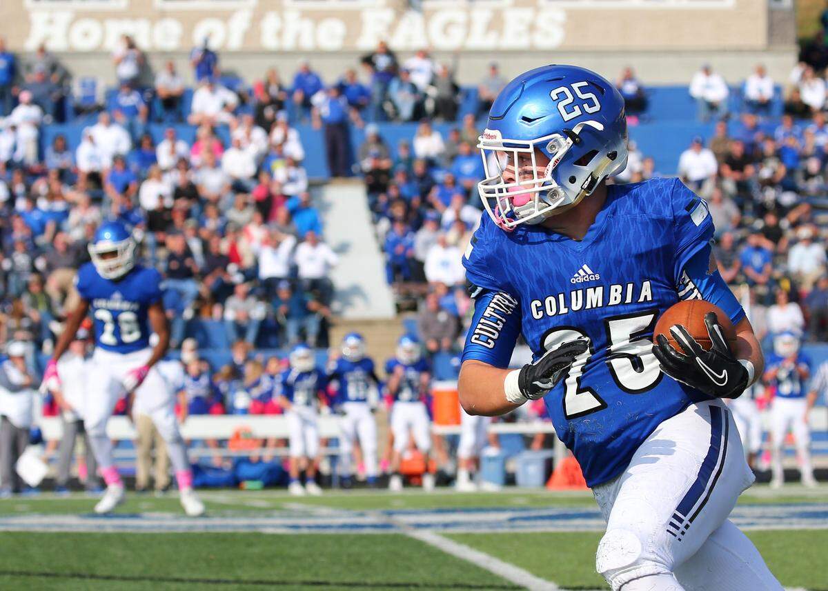 Sam Horner carries the ball after a pass reception from brother Nic Horner during the first round IHSA Class 4A playoff game between Columbia and Freeburg. Horner plays on the other side of the ball as well and was voted by area coaches as the BND All-Area Co-Defensive Player of the Year.