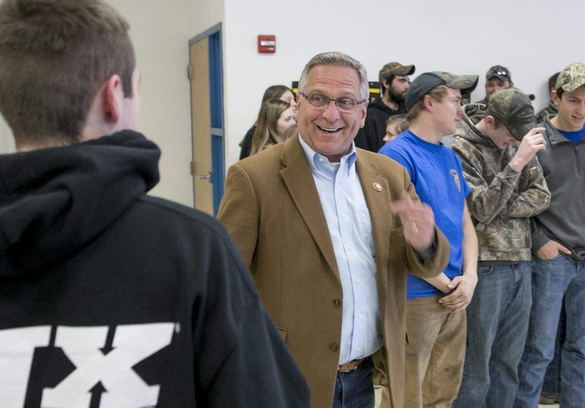 U.S. Rep. Mike Bost, R-Murphysboro, speaks with a Freeburg High School student after a presentation to students ,including members of the Future Farmers of America and civics classes on Tuesday. Bost spoke about his daily routine and answered a variety of questions from the students. Some of the questions included his stance on a border wall, his opinion on the proposed Illinois mileage tax and where he stands on the Illinois minimum wage increase, which Gov. J.B. Pritzker signed Tuesday.