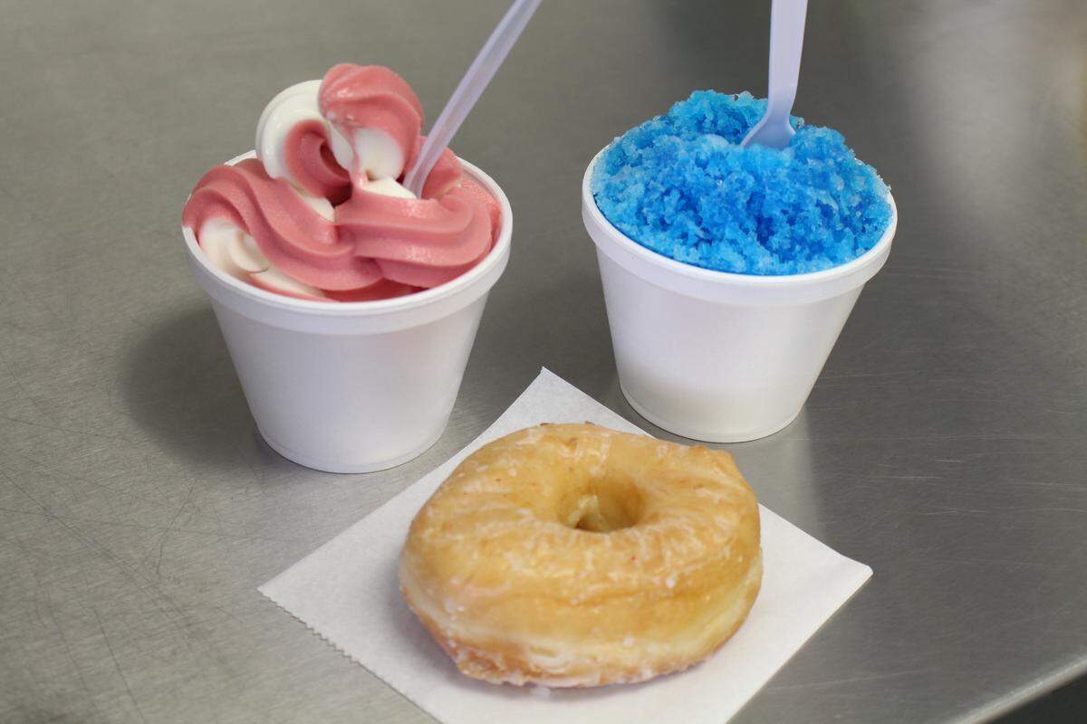 Snowie Sweet Treats in Belleville offers vanilla and strawberry swirl soft-serve ice cream, blue-raspberry shaved ice and glazed doughnuts from Pharaoh’s Donuts in St. Louis.