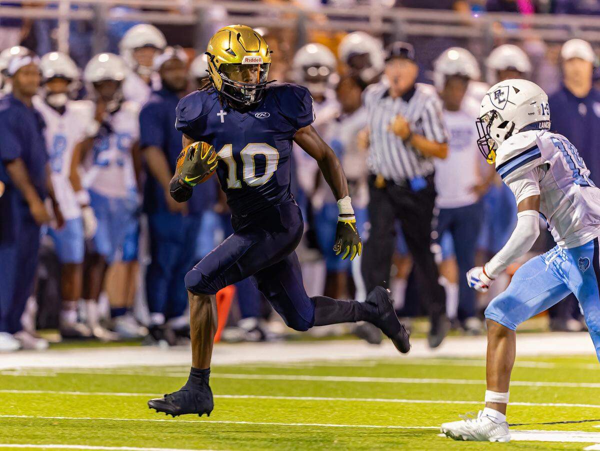 September 13, 2024 - Belleville, IL - Althoff Dierre Hill Jr. (10) runs the ball during a boys football game between Althoff and Belleville East on Friday Sept 13, 2024 at SWIC Southwestern in Belleville IL. [Photo: Jimmy Simmons]