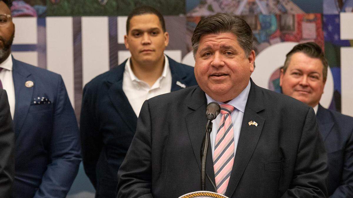 : Gov. JB Pritzker speaks to reporters at a Monday news conference celebrating the continued recovery of the tourism industry.