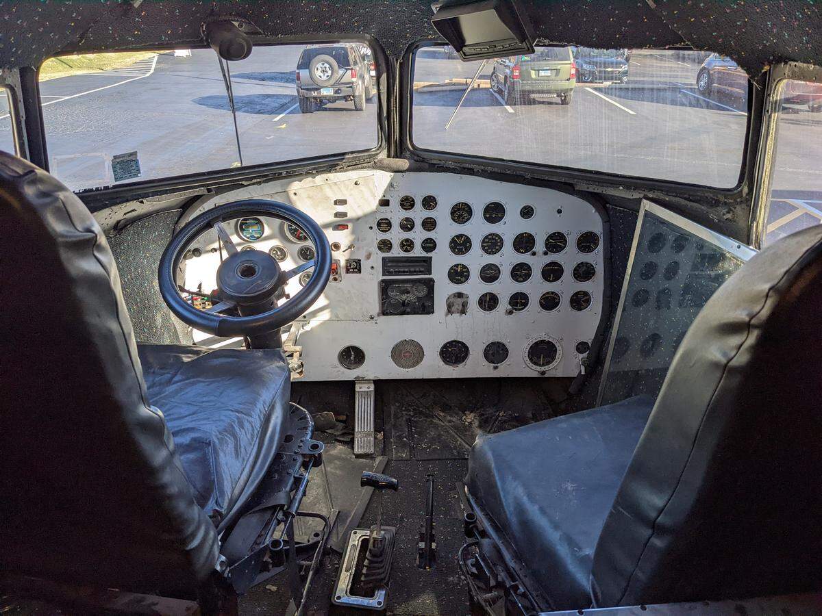 The “cockpit” of the Space Shuttle Café still has the original contol panel dials and pilots seats of the DC-3 plane it was made from.