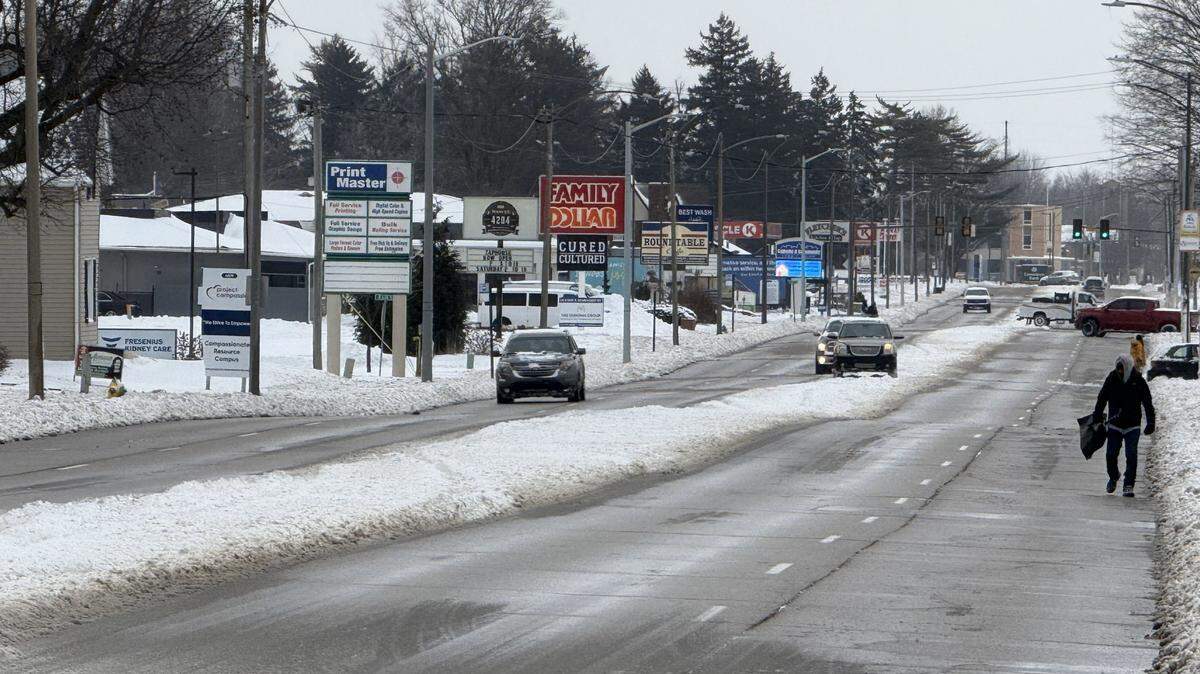 The view east on West Main Street near 70th Street early Monday afternoon following a weekend storm that dumped about 7 inches of snow and sleet in Belleville.