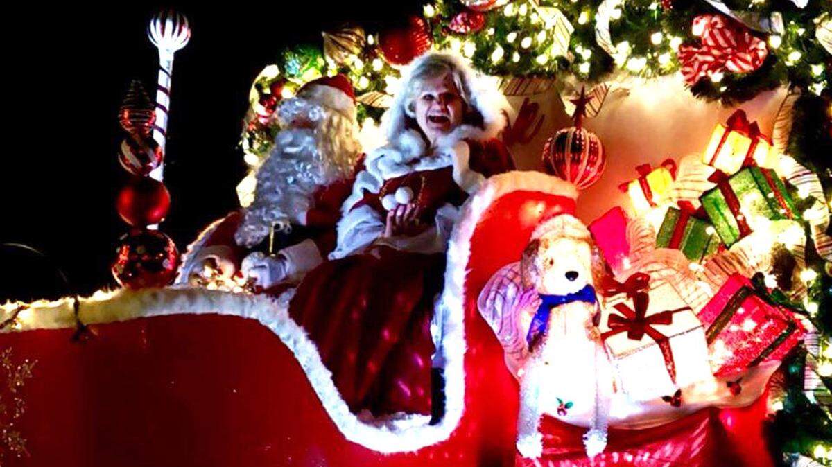 Santa and Mrs. Claus greet everyone at the end of the parade.