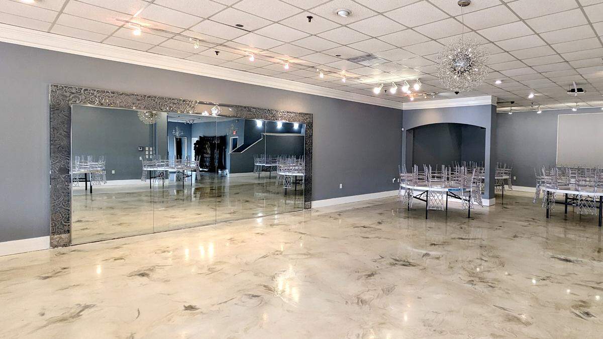 Mirrors along the wall give the appearance of a larger space at Belleville’s Bliss Events.