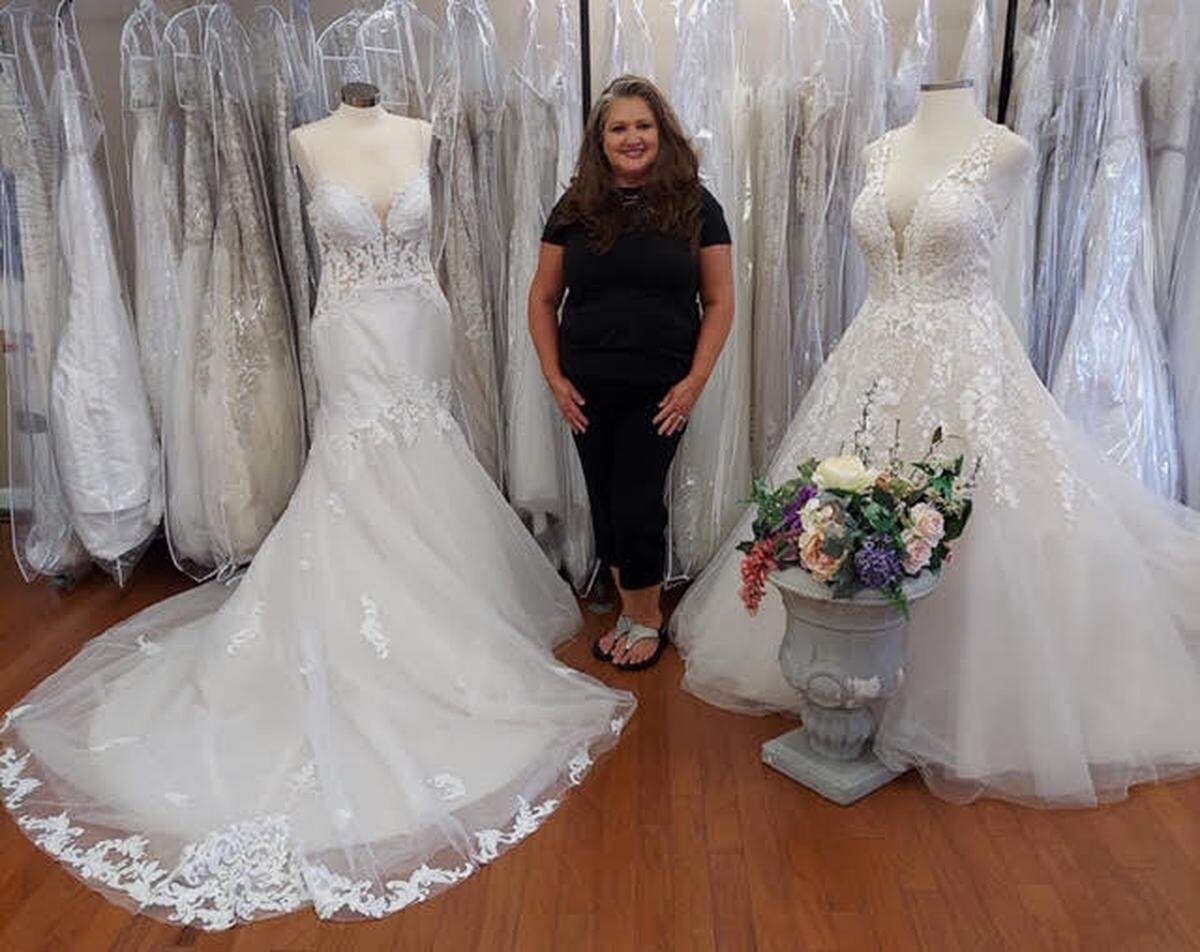 Lydia Herman, owner of Champagne and Lace Bridal in Collinsville, sold custom face coverings and T-shirts that read “Quarantined Bride 2020” during the COVID-19 shutdown. She also gave virtual tours of her wedding-dress inventory.