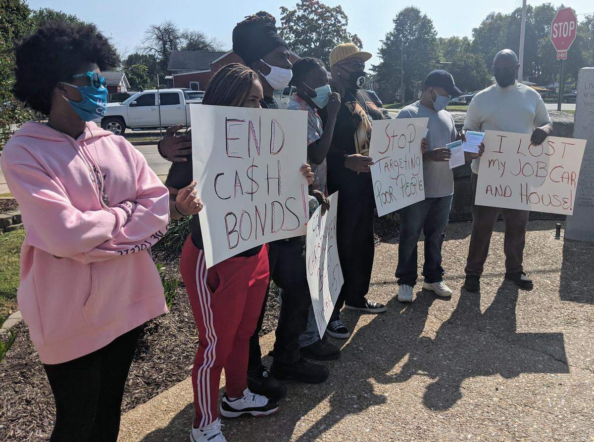 Protesters gathered at the St. Clair County Jail on Saturday, Sept. 26, in support of the Pretrial Fairness Act, a piece of legislation that would end cash bonds and pretrial incarceration in Illinois.