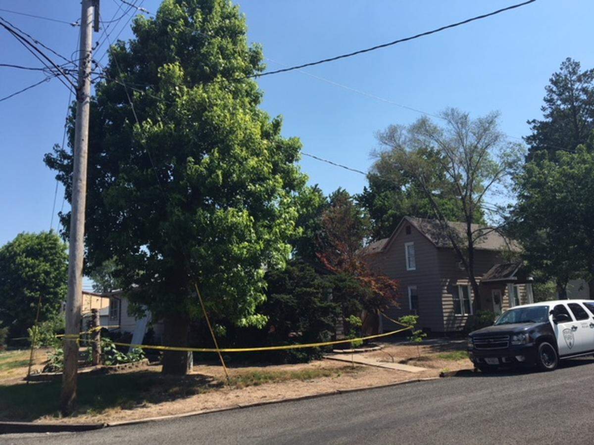 Crime-scene tape surrounded a house Saturday in the 600 block of Illinois Avenue in Collinsville following a fatal shooting.