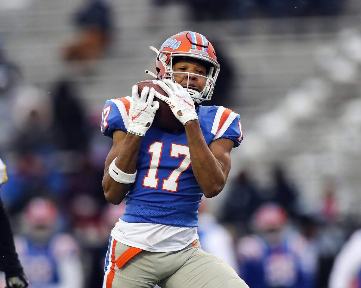 November 12, 2022 - East St. Louis, IL - East St. Louis Dejerrian Miller hauls down a pass during the IHSA, 6A, Quarterfinal playoff game between Crete - Monee and East St. Louis. The 45-0 victory will advance the Flyers to the Semifinals. [Photo: Chris Johns]