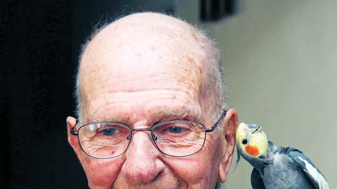 Clarence C. "Bud" Voellinger, of Swansea, with Jake.