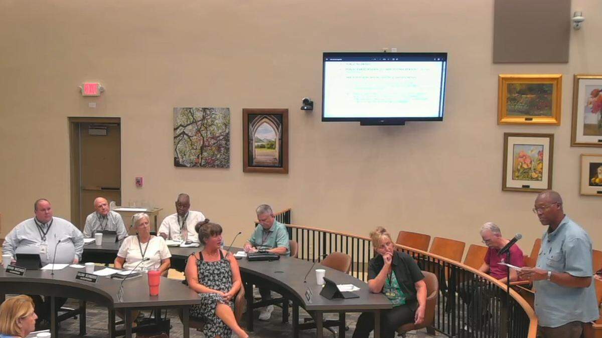 Director of Human Resources Bill Clay, right, speaks during the public-comment period of Tuesday night’s Belleville City Council meeting. He accused Ward 4 Alderman Raffi Ovian, second from left, of telling lies about him.
