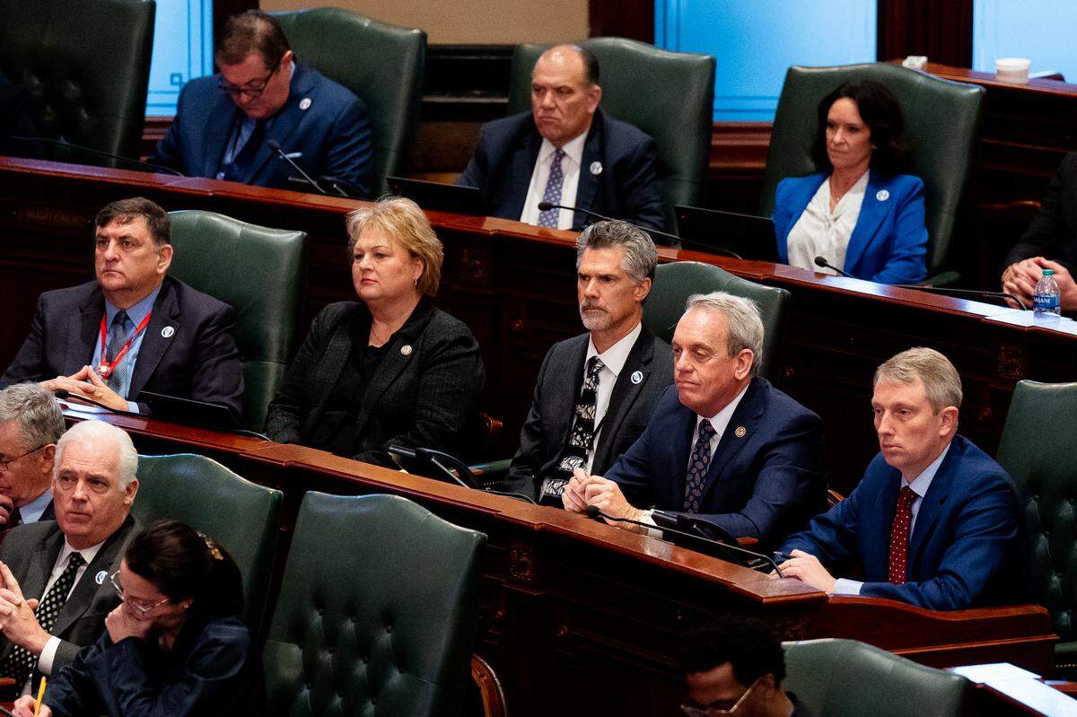 Southern Illinois legislators Sen. Dave Severin (R-Benton), Sen. Terri Bryant (R-Murphysboro), Rep. Dave Friess (R-Red Bud), Rep. Dale Fowler (R-Harrisburg), and Rep. Patrick Windhorst (R-Metropolis) listen into Gov. J.B. Pritzker’s budget address on Wednesday, Feb. 15, 2023, in the Illinois House of Representatives chambers in Springfield, Ill.