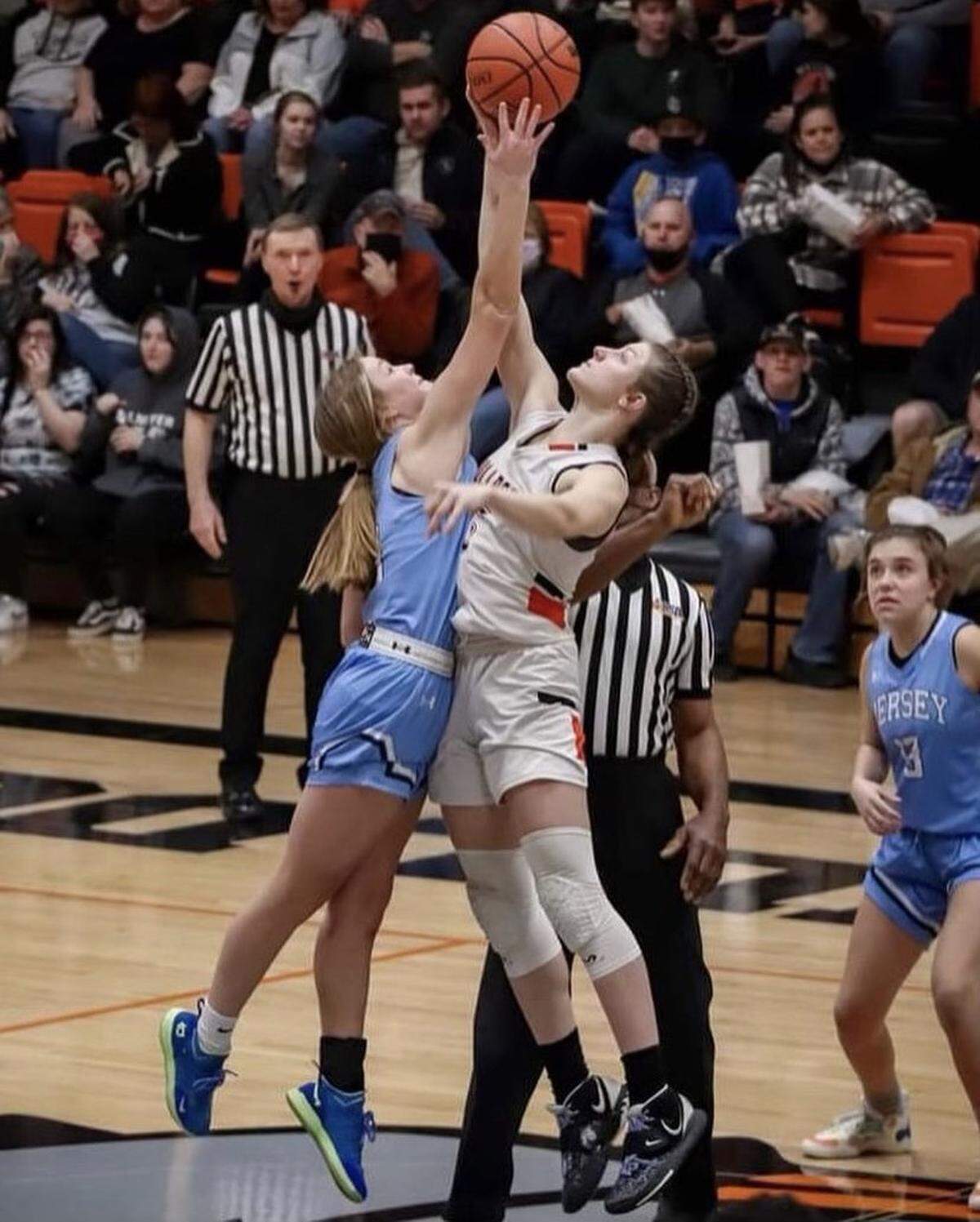 Waterloo High School’s Norah Gum, right, rises for the jump ball during a game this season. Gum is the winner of this week’s Belleville News-Democrat Girls Player of the Week high school basketball poll, as selected by readers of bnd.com.
