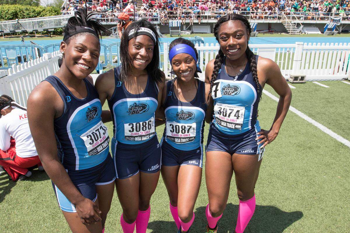 Belleville East’s Ahmiya Bills, Aaliyah Thomas, Essence Winters and Sunnie Collins after winning the Class 3A 4x100-Meter Relay Championship race at the IHSA Track and Field State Finals on Saturday, May 18, 2019.