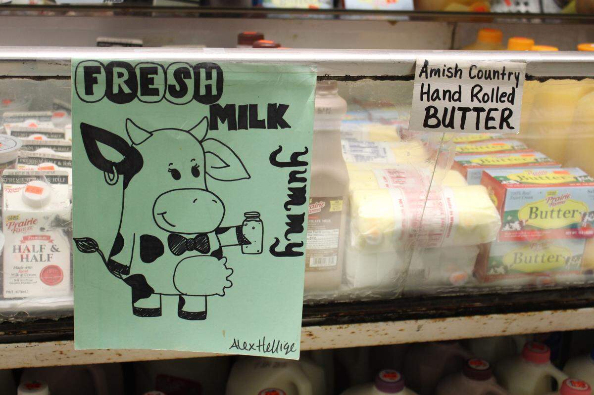 Hellige’s Super Market & Lockers in Breese advertises meat, produce and grocery items with handmade signs.