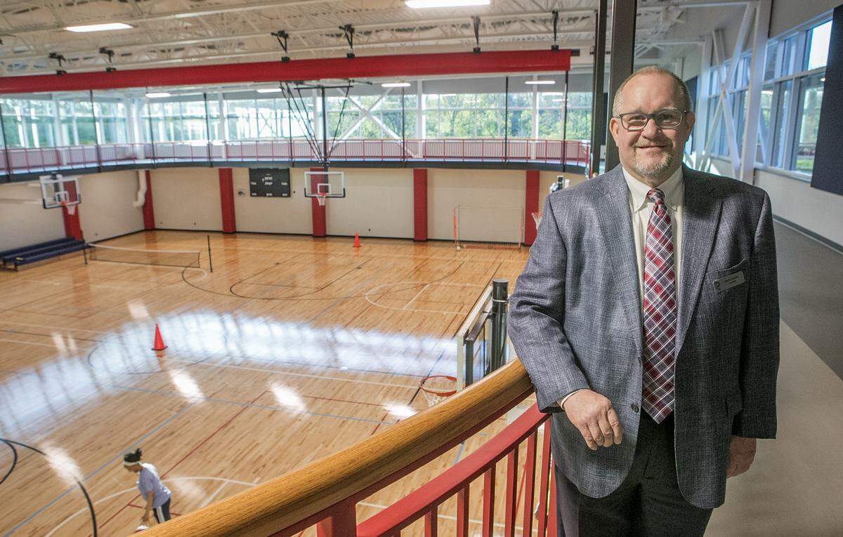 Fairview Heights Mayor Mark Kupsky poses on The Rec’s indoor walking and running track, which overlooks the gymnasium. The city’s new $21 million recreation complex will open May 6.