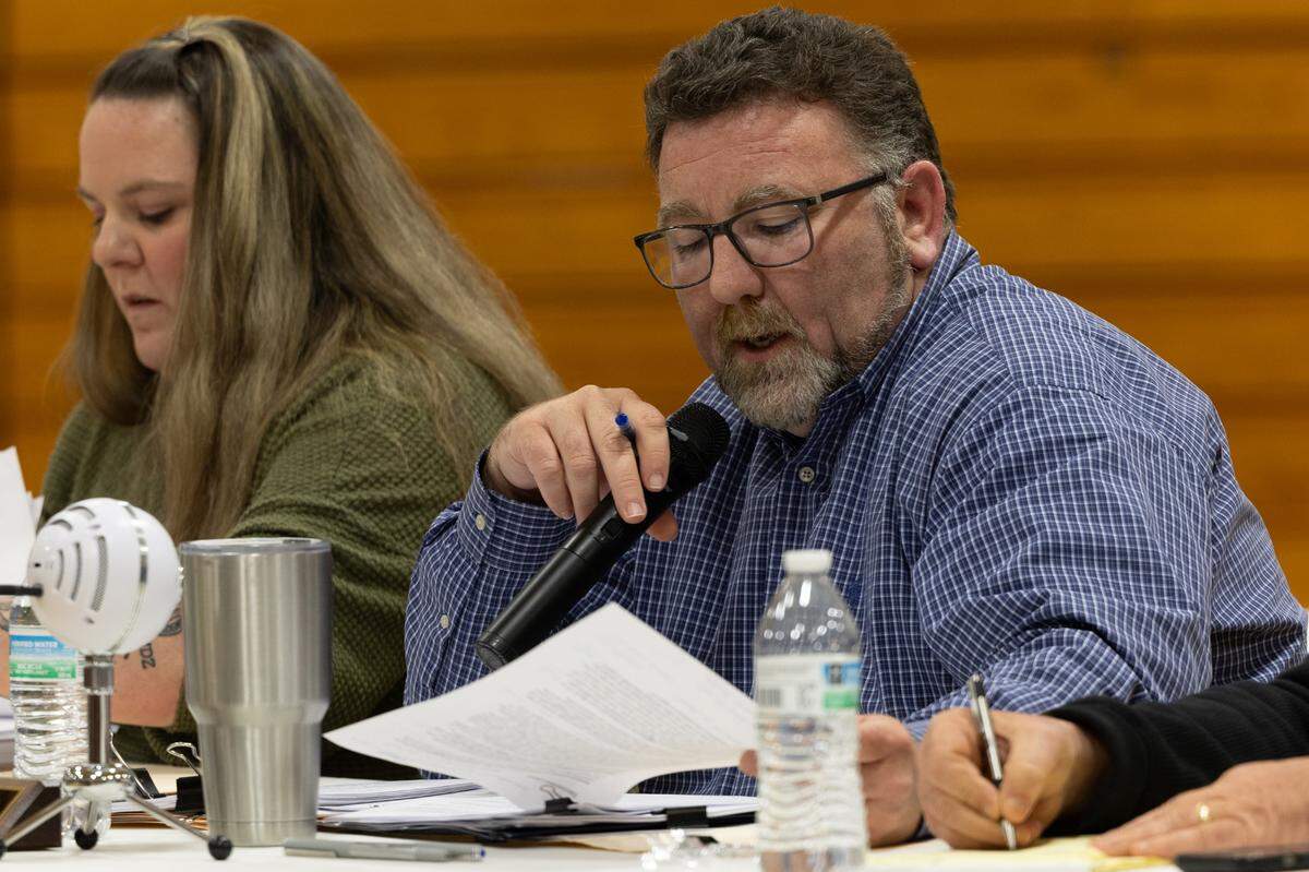 Grant District 110 Superintendent Matt Stines speaks to teachers, parents and community members at a school board meeting on March 26, 2024, in Fairview Heights, Ill.