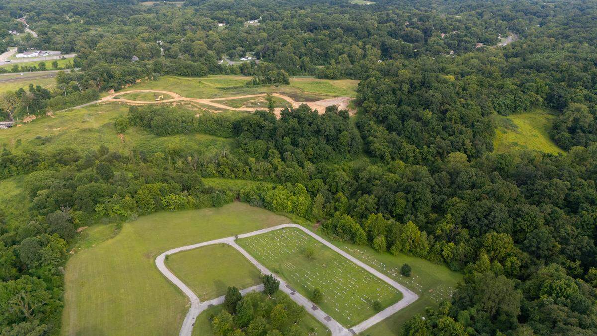 This drone image shows a section of Mount Carmel Cemetery in Belleville in the foreground and a borrow pit that’s partially on land leased by the Catholic Diocese of Belleville in the background.