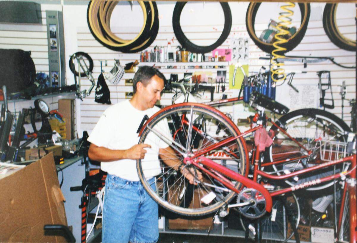 Steve Parks repairs a bicycle in the early 1980s at the second location of his business on North Main Street in Edwardsville. At that time, it was called Edwardsville Cyclery and Sports.