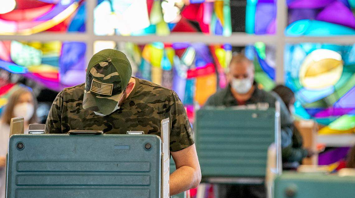 Voters fill in their ballot at the polling location inside of Holy Trinity Catholic Church in Fairview Heights. This location had a brief line when they opened, but voting was going fairly quick around 10 am.