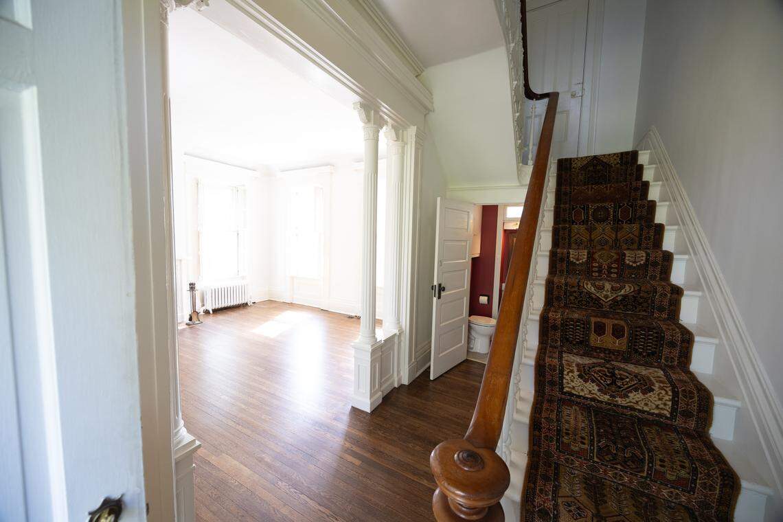 Small, ornate stairs take you to the second floor of the home.