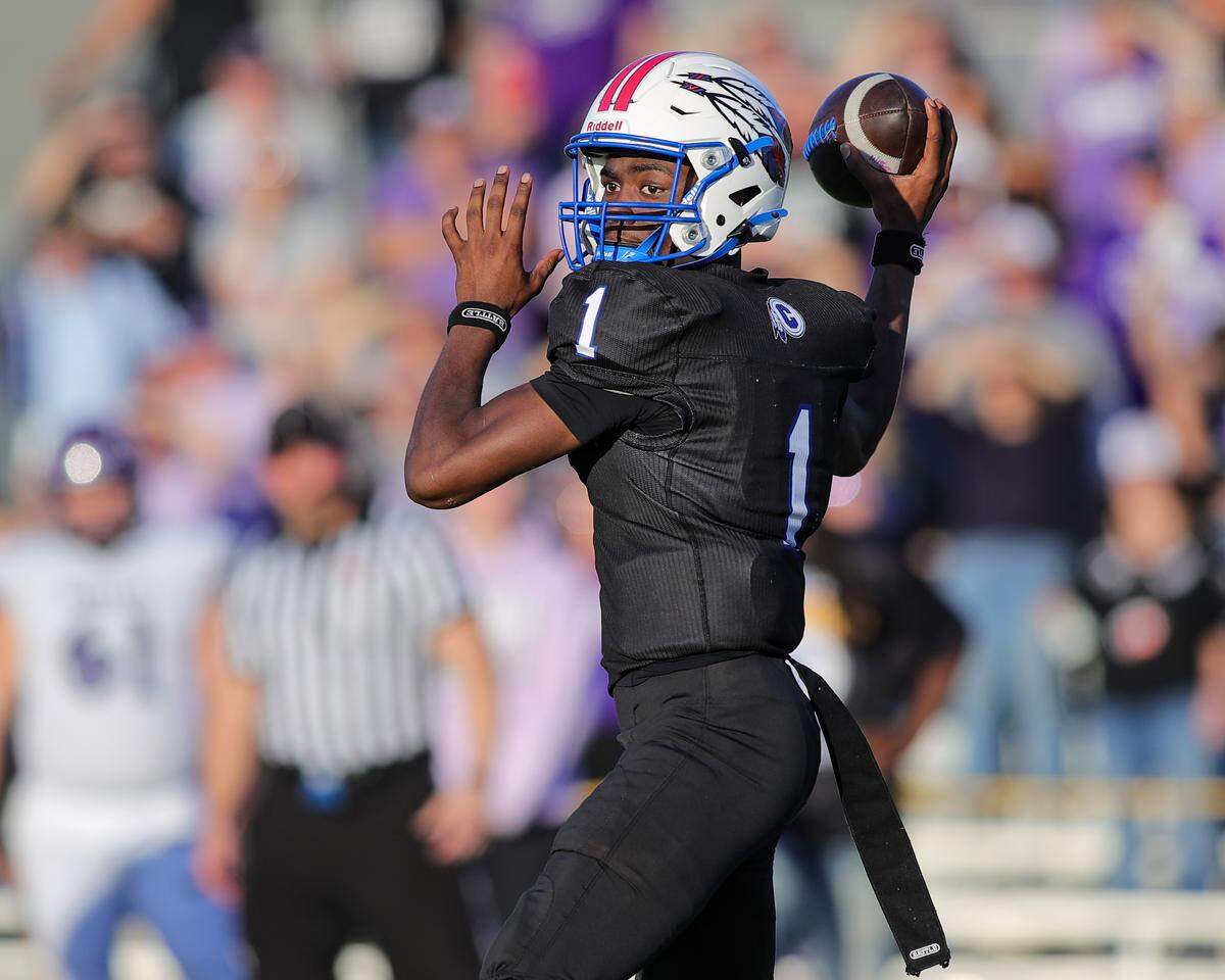 Cahokia quarterback Nigel Gooden looks for a receiver during the IHSA Class 4A quarterfinal playoff game agaisnt Breese Central Saturday.