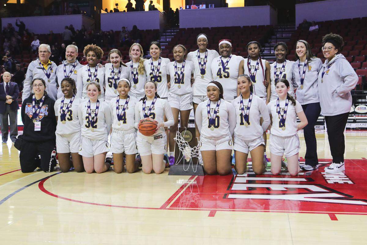 Pictured is the O’Fallon basketball team after defeating Lisle Benet Academy 62-57 in the IHSA Class 4A state championship game at CEFCU Arena (formerly Redbird Arena) on the campus of Illinois State University.
