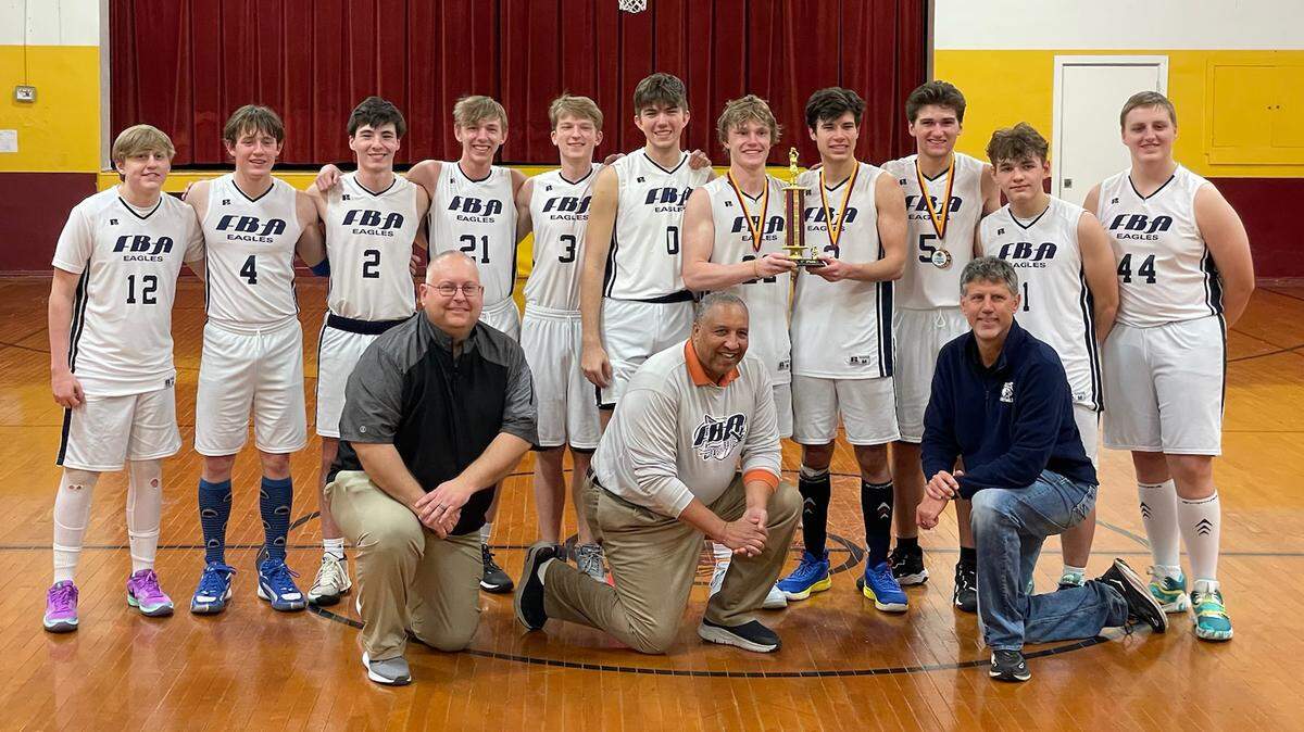 The First Baptist Academy-O’Fallon boys’ varsity basketball team journeyed to Rosamond, Illinois, on Saturday, Jan. 13, to participate in the 2024 Winter Classic hosted by Faith Bible Christian Academy. The Eagles emerged victorious, bringing home the tournament championship trophy with an unblemished record after a 49-28 victory over Christian Life Academy of Hopedale, Illinois in the championship final. Pictured left to right: kneeling - Assistant Coach Keith Albers, Assistant Coach Wayne Sanders and Head Coach John Jasper; standing - Jacob Albers, Sawyer Mitchell, Landon Moore, Bryce Flowers, Elijah Gibson, J.J. Lostutter, Ryder Courtney, Noah Jasper, Peyton Broyles, Mason Crabtree and Adam Bruce. Broyles was named to the second all-tourney team while Jasper and Courtney were first team selectees. Jasper was also selected tournament MVP. Submitted by Bill Malec of O’Fallon