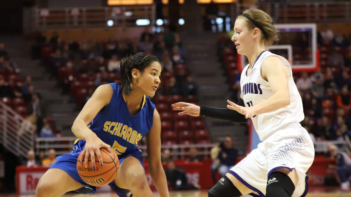 Lebanon’s Emily Reinneck guards Schlarman Academy’s Anaya Peoples during an IHSA Class 1A state semifinal game at Redbird Arena on the campus of Illinois State University in Bloomington-Normal in March 2018. The IHSA has announced the girls basketball state finals will remain at Redbird Arena for the next three seasons.