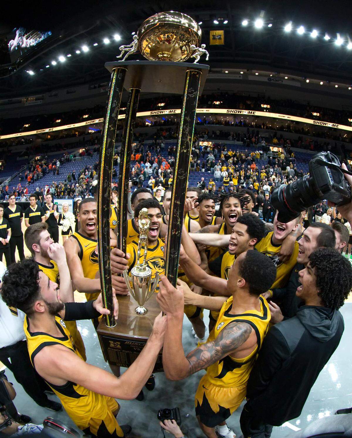 The Missouri Tigers celebrate their victory against Illinois Fighting Illini during Saturday’s NCAA Braggin’ Rights game at the Enterprise Center in Saint Louis Missouri.