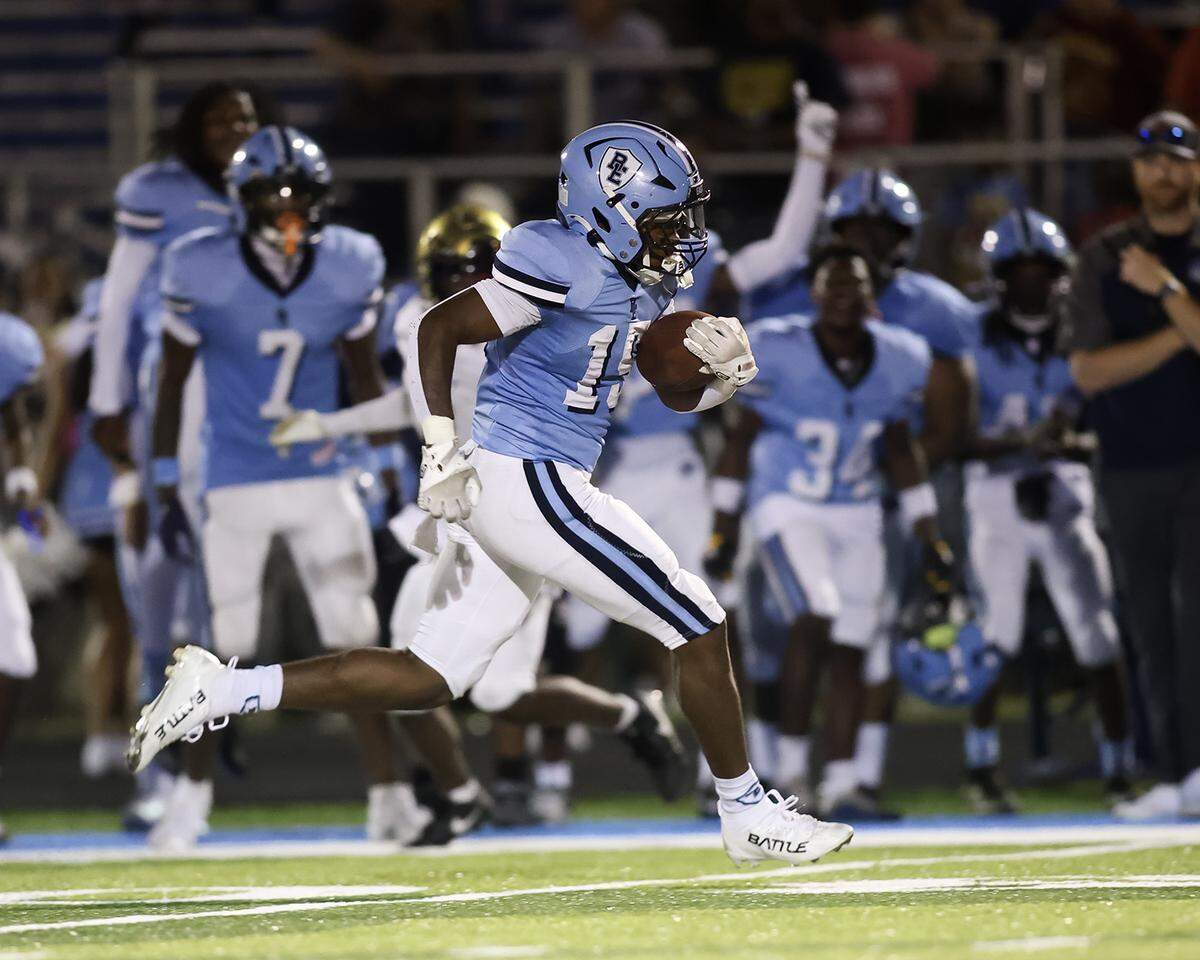 Josh Ware scores a touchdown.