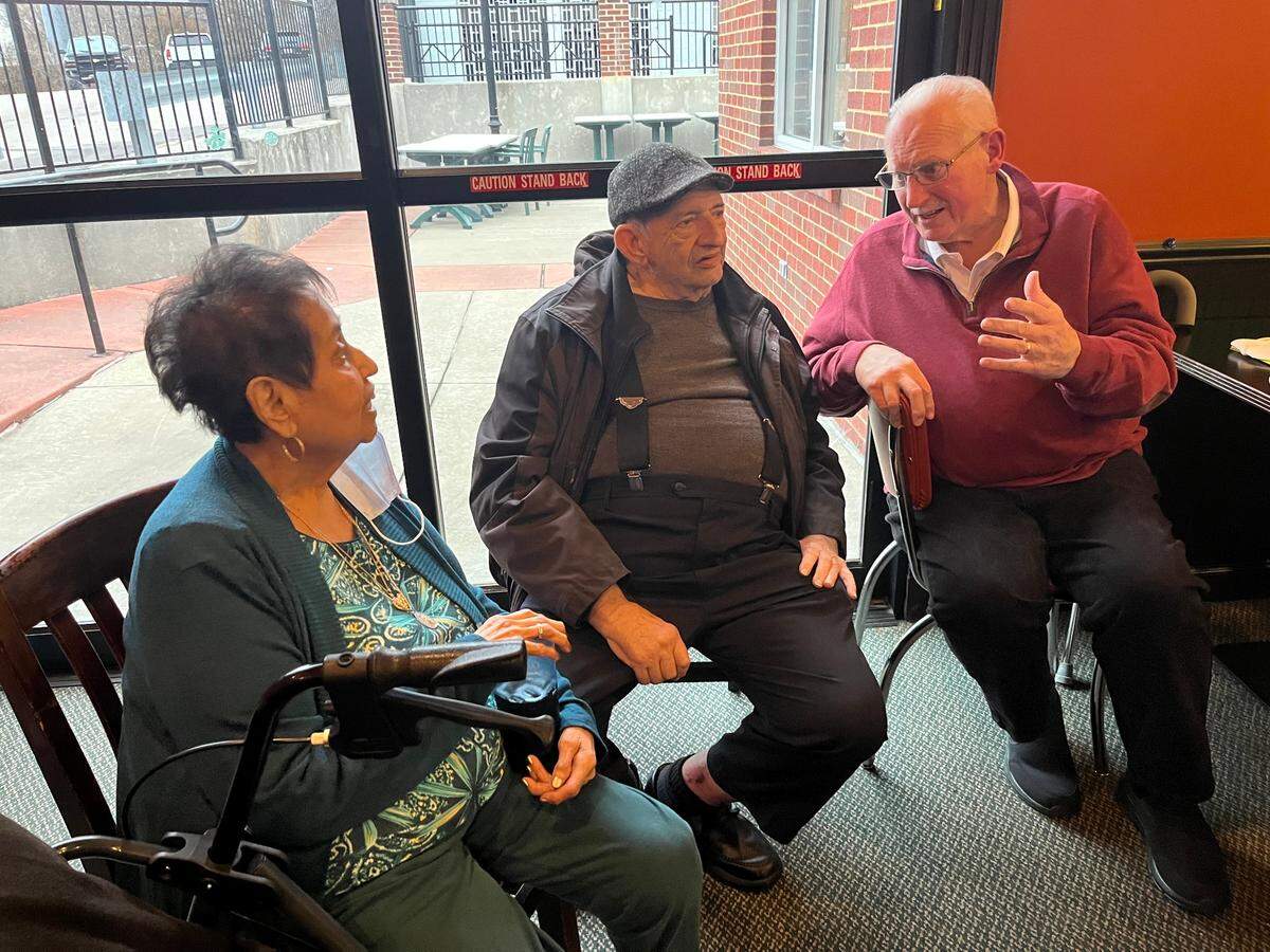 This file photo from 2023 shows former Belleville Mayor Mark Eckert, right, visiting with, Joe Hubbard, and Hubbard’s wife, Julie, at Eckert’s 67th birthday party. Eckert died later that year and Joe Hubbard died this week.