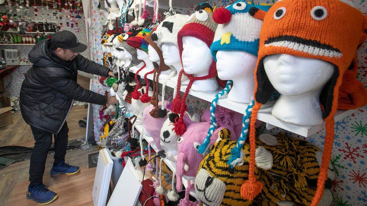 Shyam Basnet with Whimzy Collection prepares his chalet at the 8th annual Belleville Christkindlmarkt in downtown Belleville. Whimzy Collection features handmade items from Nepal, including cashmere scarves, unique hats, felt dryer balls and felt coin purses and ornaments. The holiday market schedule is Friday, Nov. 26, through Sunday, Nov. 28; Thursday, Dec. 2, through Sunday, Dec. 5; Thursday, Dec. 9, through Sunday, Dec. 12; and Thursday, Dec. 16, through Thursday, Dec. 23. Hours are 11 a.m. to 8:30 p.m. Thursdays-Saturdays; 11 a.m. to 6 p.m. Sundays; and 11 a.m. to 5 p.m. Thursday, Dec. 23. The open-air German Christmas Market features food, handcrafted and unique gifts. bellevillechristkindlmarkt.com
