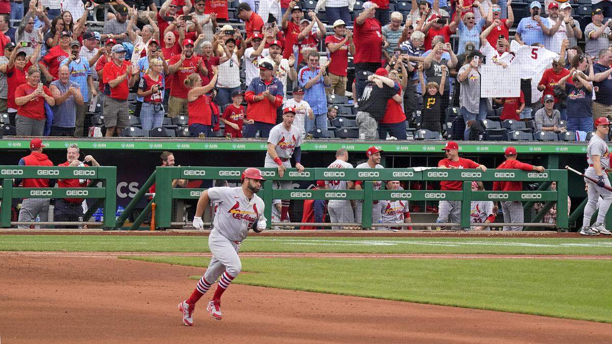 St. Louis Cardinals’ Albert Pujols rounds the bases after hitting his 697th career home run, a two-run home run off Pittsburgh Pirates relief pitcher Chase De Jong, during the ninth inning of a baseball game in Pittsburgh, Sunday, Sept. 11, 2022. The Cardinals won 4-3. (AP Photo/Gene J. Puskar)