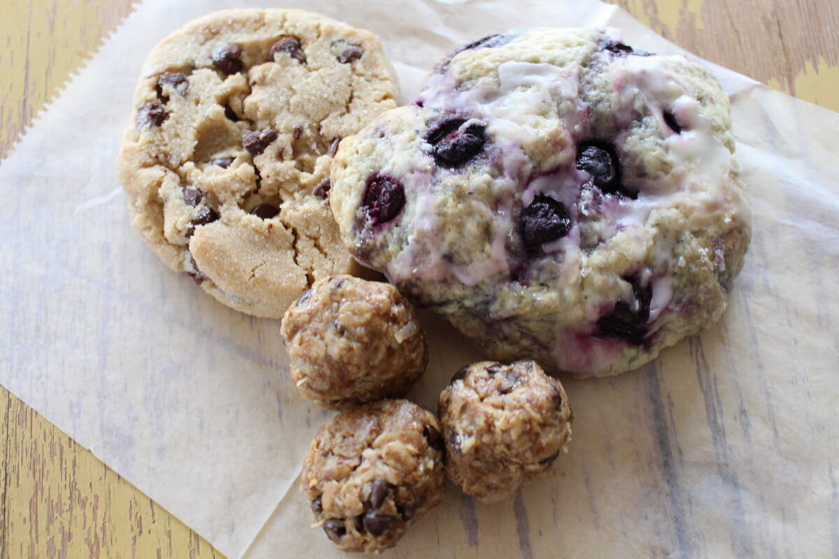 Verona Coffee Co. in downtown Collinsville makes its own pastries, including blueberry scones, clockwise from right, peanut butter energy bites and chocolate chip cookies.