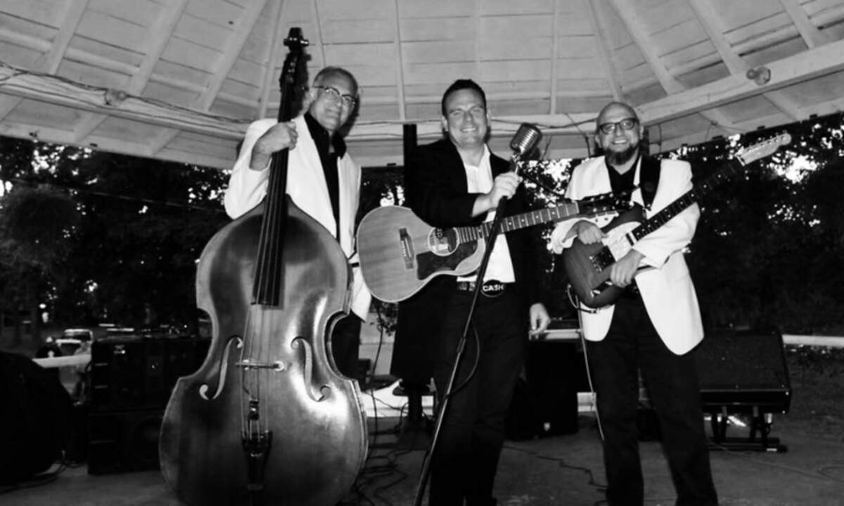 Johnny Cash tribute artist Bill Forness, center, sometimes plays in a trio with upright bass player Mike Graham, left, and guitarist Travis Mattison. They also are part of his One More Round band.
