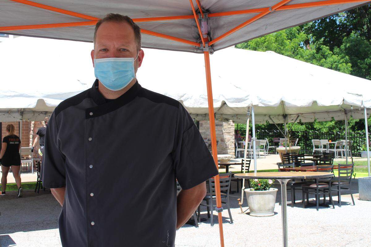Patrick Thirion, co-owner of three Peel Wood Fired Pizza locations, built a temporary outdoor dining area that seats about 80 people in Edwardsville.
