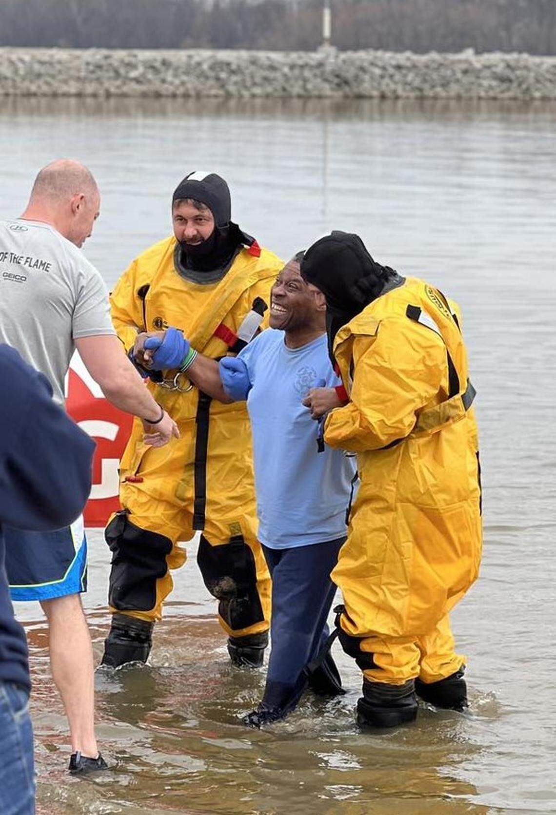 The O’Fallon Police Department team had the honor of plunging first during the Special Olympics Polar Plunge on Feb. 25. They raised over $38,000 for the Special Olympics.&nbsp;Pictured, Tony Hill, one of the&nbsp;athletes and Special Olympics Global Messenger, took the first dip into the 37-degree water at Carlyle Lake.