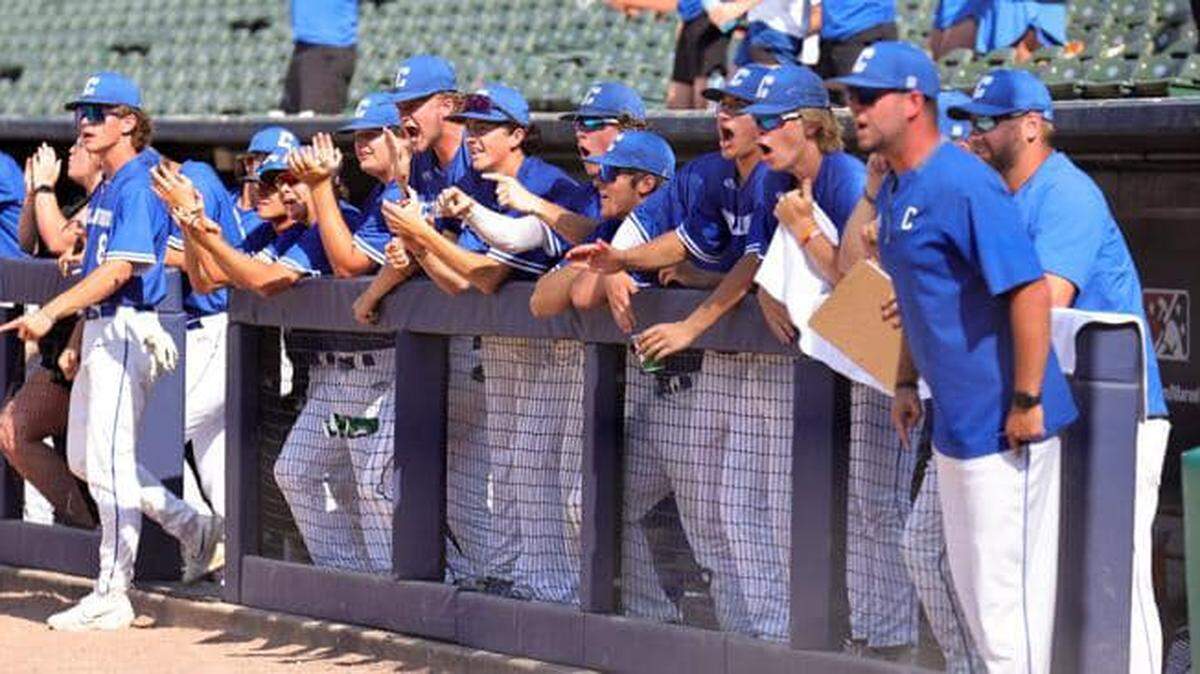 Members of Columbia’s baseball team root on their teammates during the IHSA Class 2A state semifinals at Dozer Park in Peoria. The Eagles defeated Chicago DePaul College Prep High School 9-0 to advance to the state championship game.