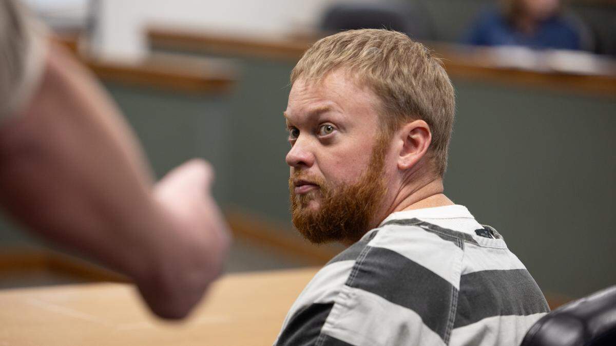 Sammy Shafer Jr., who is accused of hiring two men to murder 32-year-old Collinsville woman Portia Rowland, looks back at a bailiff after his pre-trial detention hearing on Feb. 5, 2025.