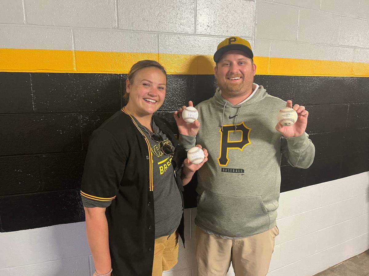 Pittsburgh Pirates fans Matt and Samantha Brown display the record-setting home run ball St. Louis Cardinals star Albert Pujols gave them. Pujols hit is 697th career round tripper Sunday against the Pirates on Sunday to surpass Alex Rodríguez on the all-time home run list. The Browns tried returning the ball to Pujols, but he told them to keep it.
