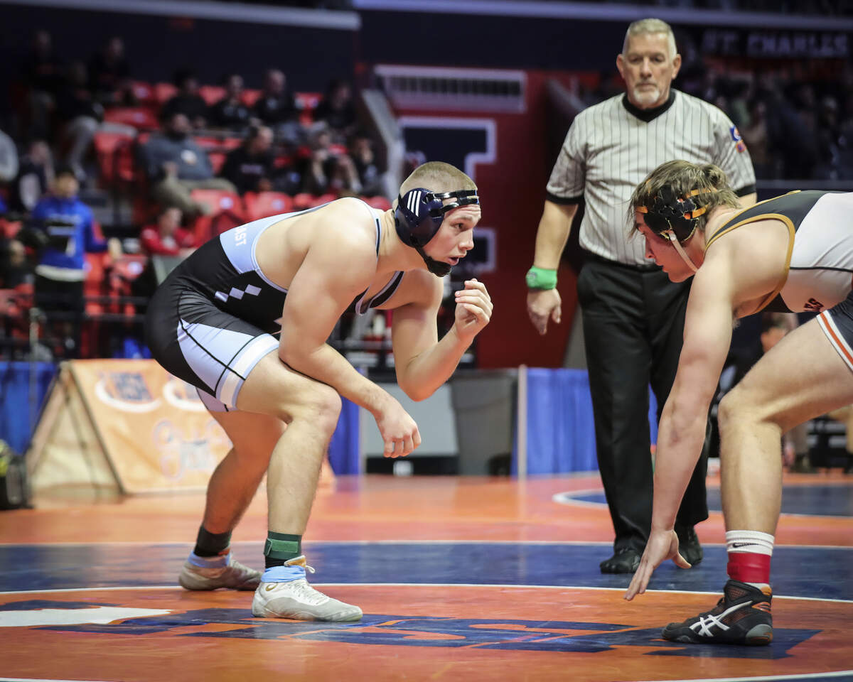 Belleville East’s Dominic Thebeau wrestles St. Charles East’s Brandon Swartz during their quarterfinal match at the 2023 IHSA Individual Wrestling State Finals on Friday in Champaign. Thebeau went on to a 13-2 win.
