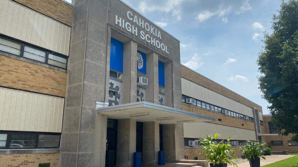 Window air conditioning units are visible along the front side of Cahokia High School in Cahokia Heights, IL.