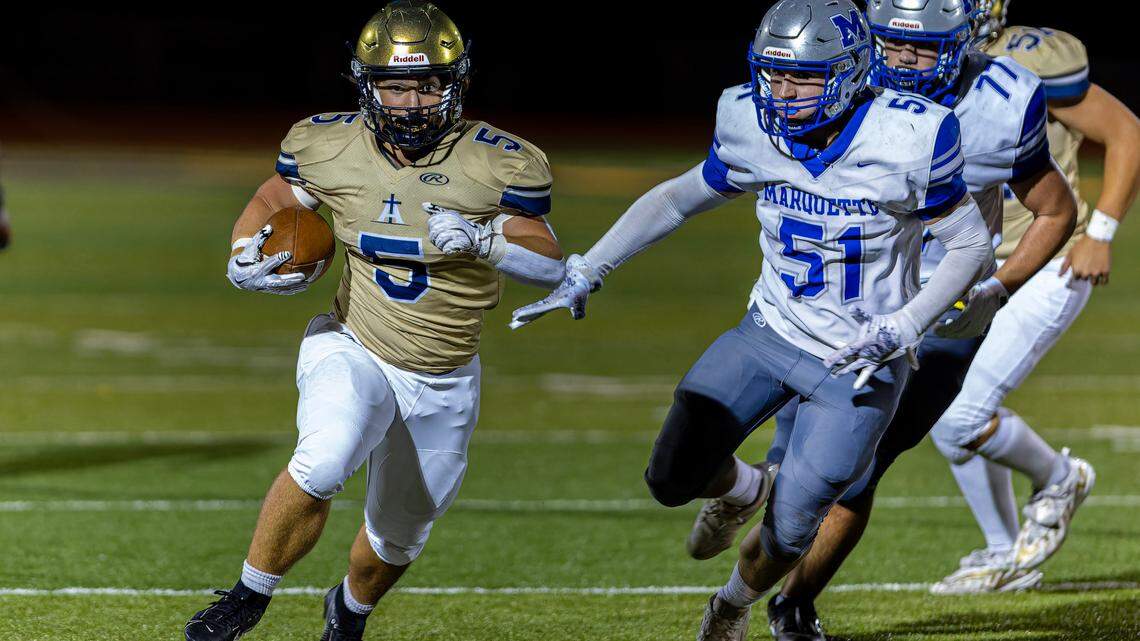 Althoff ducks Helene’s rain, dominates Marquette in rescheduled Homecoming game