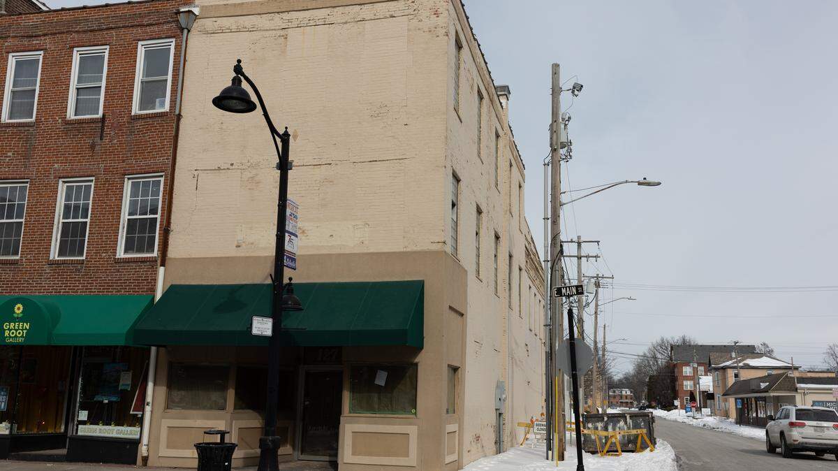 A developer plans to renovate this vacant brick building at 127 E. Main St. in downtown Belleville into a “boutique” hotel, bar and offices. Built in 1854, it originally was combined with the building at left. It later was painted tan and had the front windows bricked up.