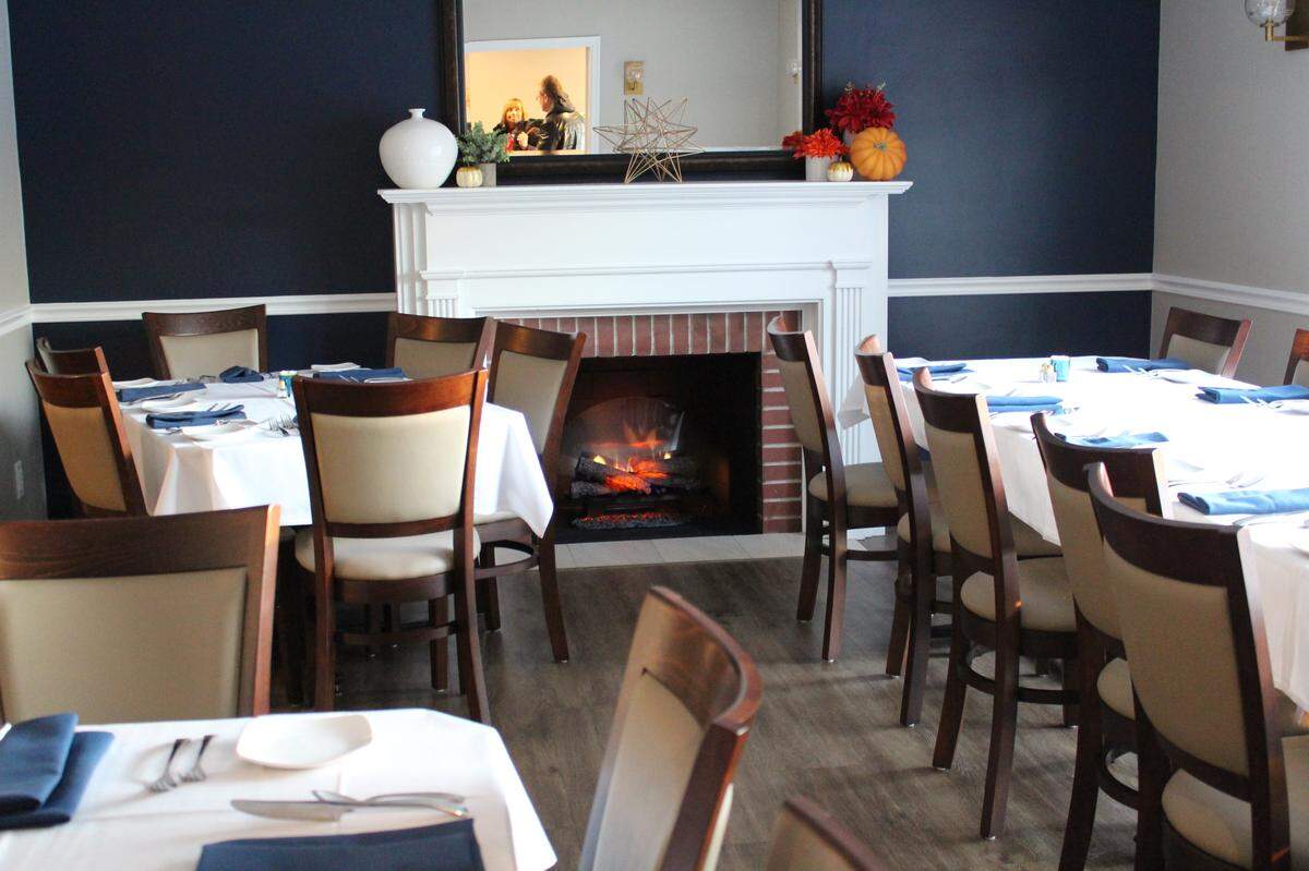 A gas fireplace keeps things cozy in the main dining room of Moussalli’s Prime, which is housed in a former brick ranch house on the outskirts of Edwardsville.