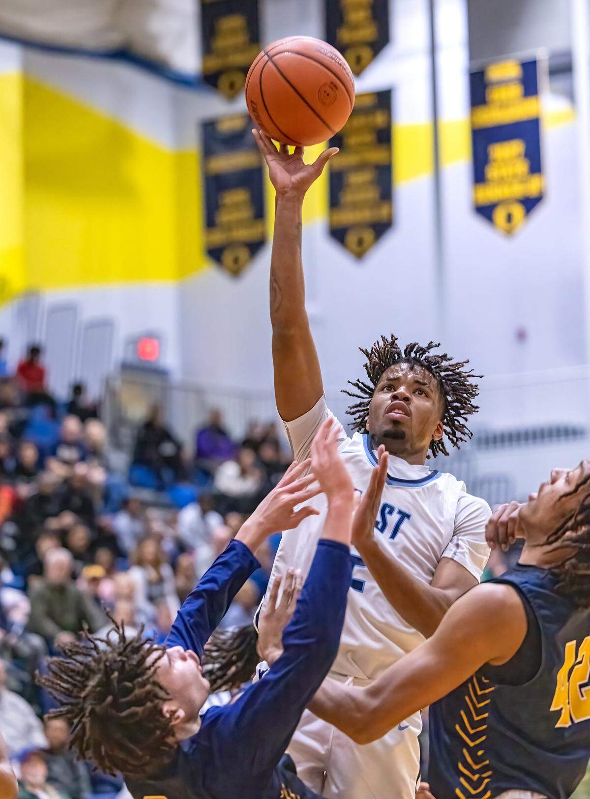 Belleville East’s Antwine Wilson puts up a shot during Friday night’s IHSA Class 4A regional championship game. The Panthers ultimately prevailed 52-50.